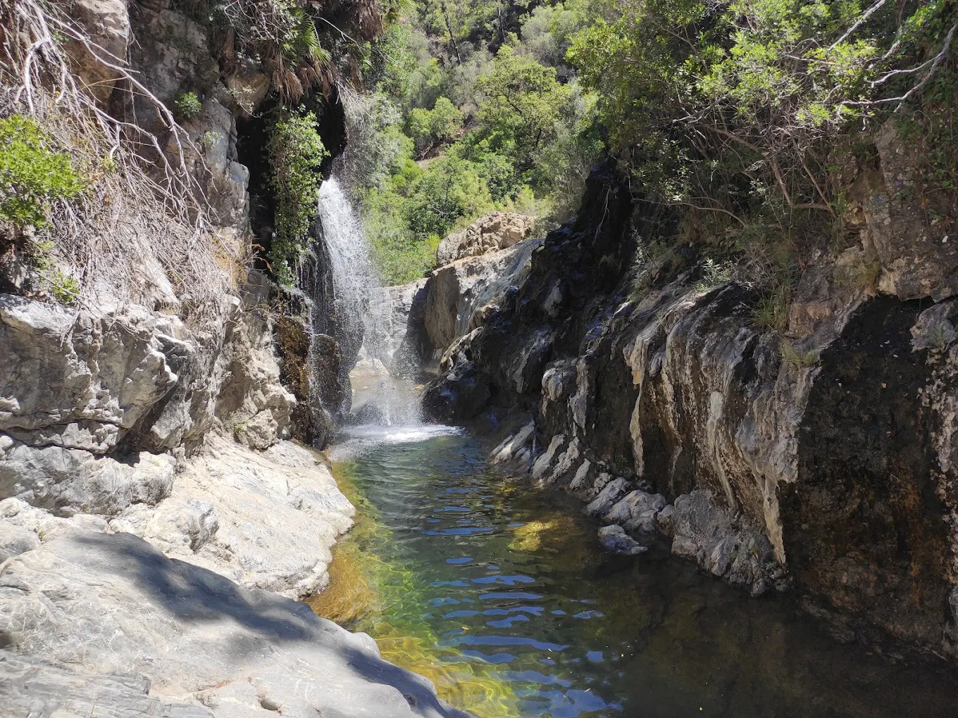 The waterfall and natural pool at Charco del Canalon